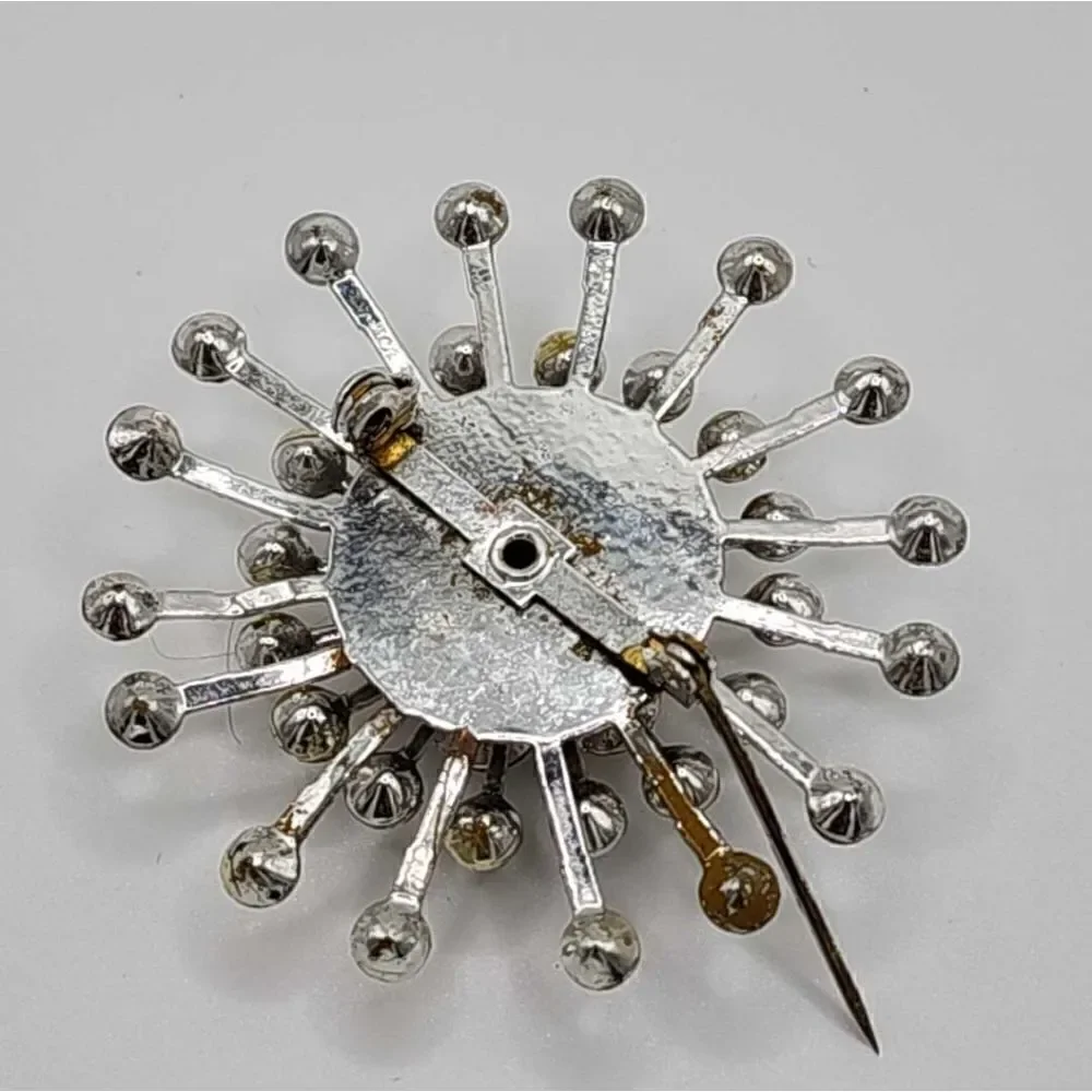 5/$20 Vintage silver rhinestone burst brooch